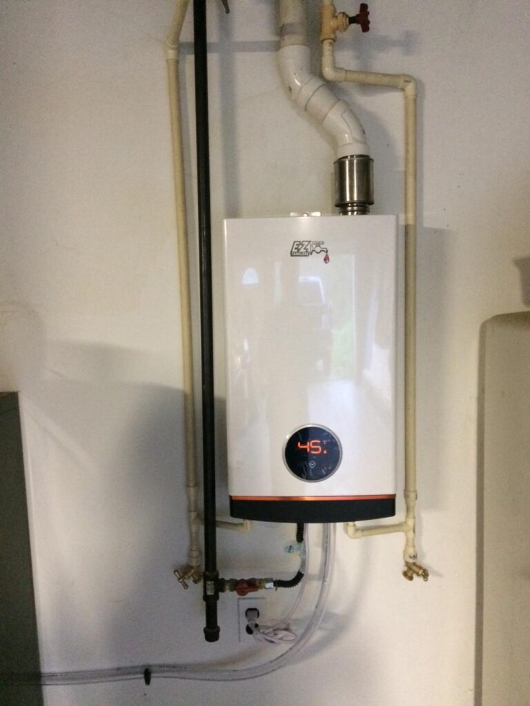 A picture is been click after installing the EZ Ultra HE Natural Gas Indoor Condensing Tankless Water Heater